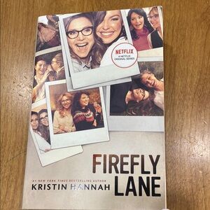“Firefly Lane”, by Kristin Hannah, paperback book.